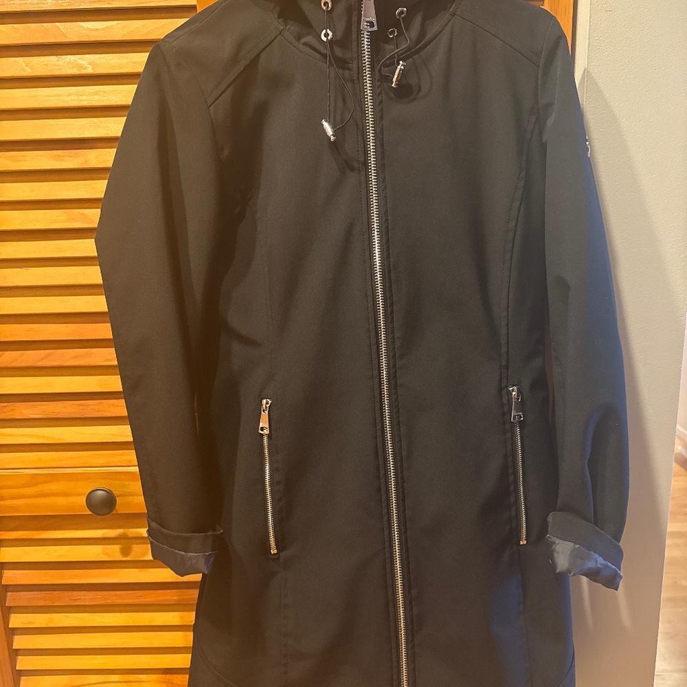 Calvin Klein raincoat with hood.